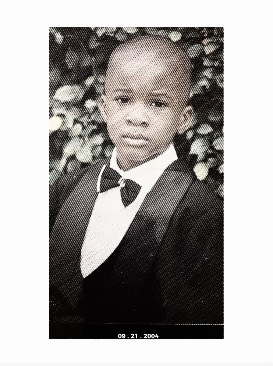 Me as a child in a tuxedo and bow tie